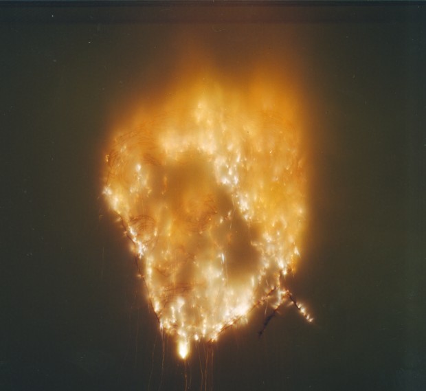 Inheritance: Exploding Jan Hoet’s Portrait (explosion event), realized at S.M.A.K, Belgium, March 28, 2003, approximately 10 seconds Photo by Dirk Pauwels, courtesy S.M.A.K. Museum of Contemporary Art