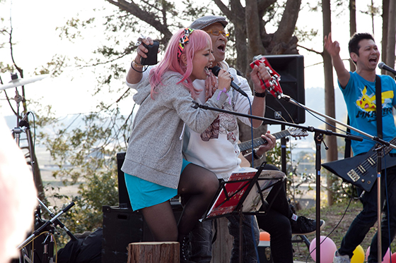 Neeko and Iwaki resident performing together during Nikoman Show, Iwaki, Japan, 2014. Photo by Wen-You Cai, courtesy Cai Studio.