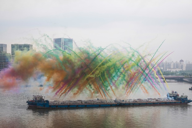 Remembrance, chapter two of Elegy: Explosion Event for the Opening of Cai Guo-Qiang: The Ninth Wave, realized on the riverfront of the Power Station of Art, 5:00 p.m., approximately 8 minutes.  Photo by JJY Photo, courtesy Cai Studio